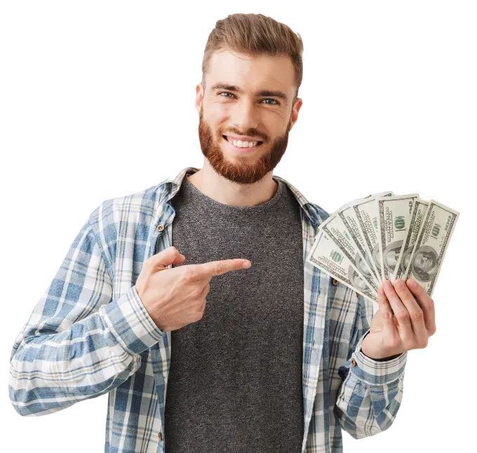 A happy person holding a handful of one-hundred dollar bills